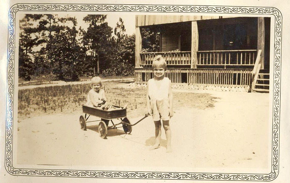 Carolyn and Blair with her little wagon, 1933